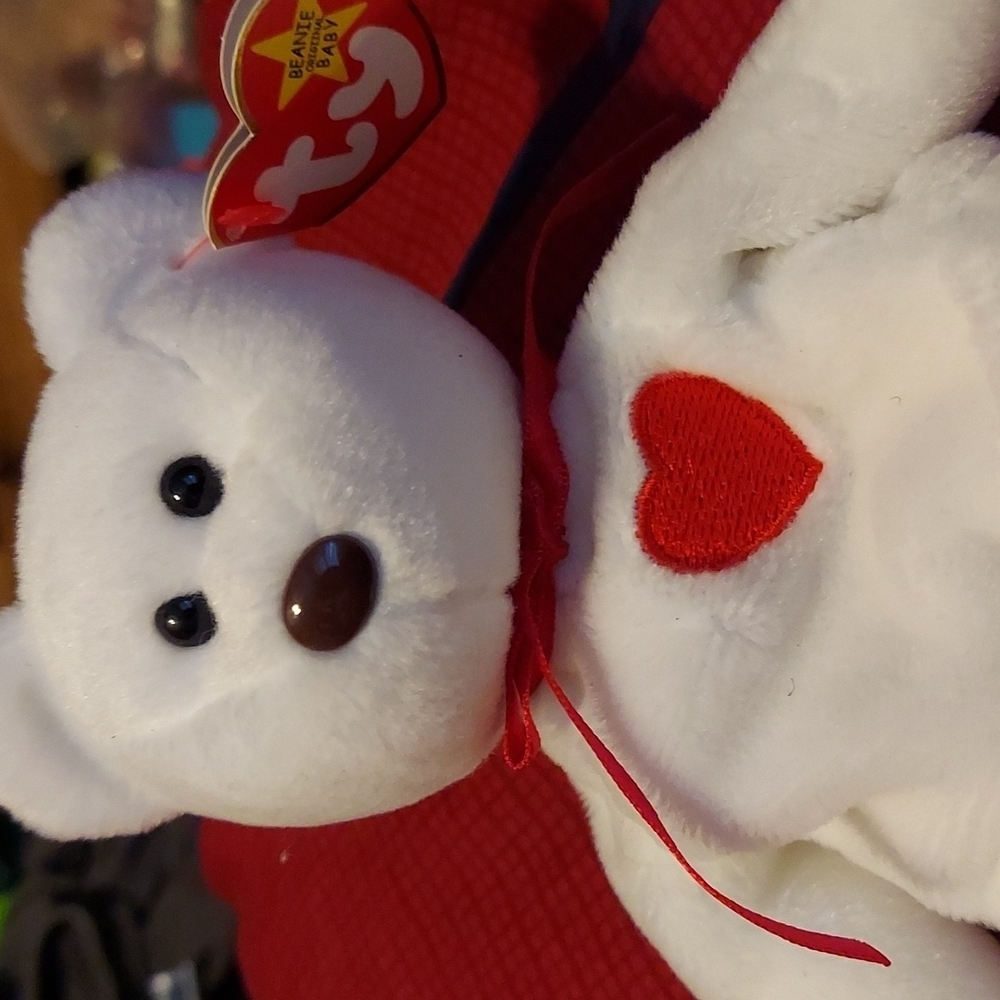 Valentino beanie baby with tons of errors